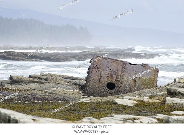 Rusty Steamship Boiler that has been in this place since the ship wrecked in 1898, Pacific Rim National Park, B C