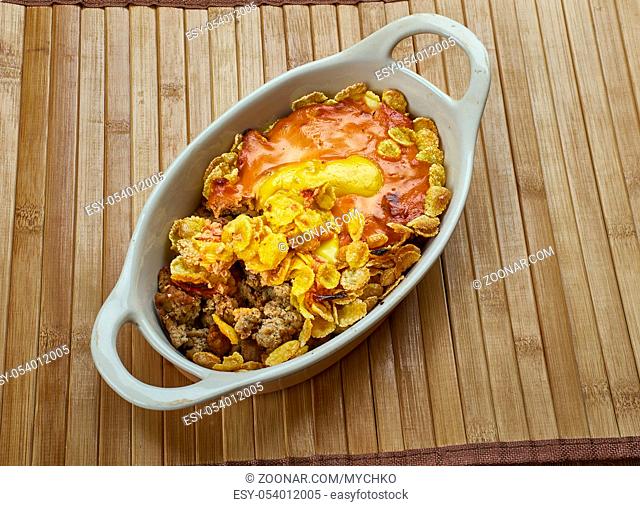 Oven Baked Frito Chili Pie, Sprinkle about half the shredded cheese atop the Fritos