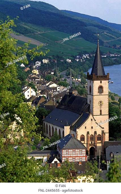 Church in town at riverside, Rhine River, Lorch, Baden-Wurttemberg, Germany