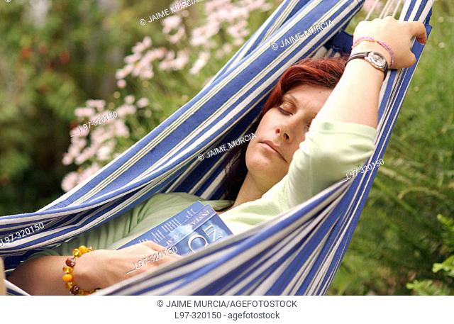 Sleeping lady in hammock