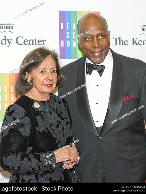 Vernon Jordan and his wife, Ann, arrive for the formal Artist's Dinner honoring the recipients of the 2013 Kennedy Center Honors hosted by United States...
