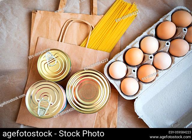 Eggs, canned food, pasta, products in environmentally friendly craft packages. Vegetarian healthy organic foods from the market