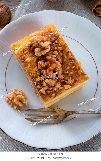 .apple strudel with vanilla pudding and nuts