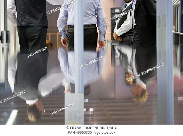 Passangers at the security checkpoint at the airport in Frankfurt Main, Germany, 03 July 2014. The USA has called for increased security out of concerns of...
