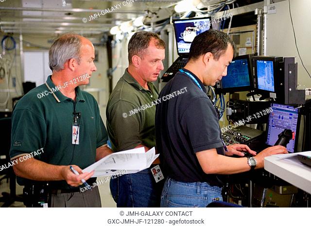 NASA astronaut Jeffrey Williams (left), Expedition 21 flight engineer and Expedition 22 commander; along with Japan Aerospace Exploration Agency (JAXA)...