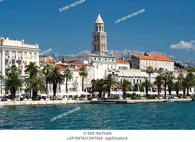 Croatia, Split Dalmatia, Split. The waterfront promenade and tower of the Cathedral of Saint Domnius in the city of Split