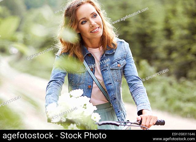 Beautiful woman riding a bike