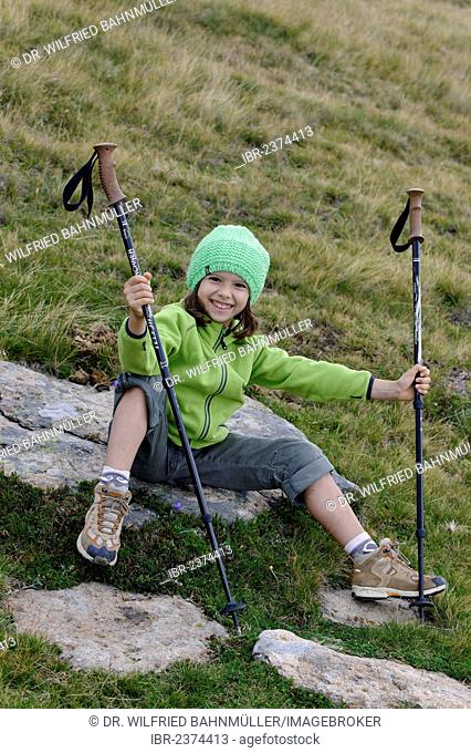 Girl hiking, Raschoetz near St. Ulrich or Ortisei, Val Gardena valley or Groednertal valley, province of Bolzano-Bozen, Alto Adige, Italy, Europe