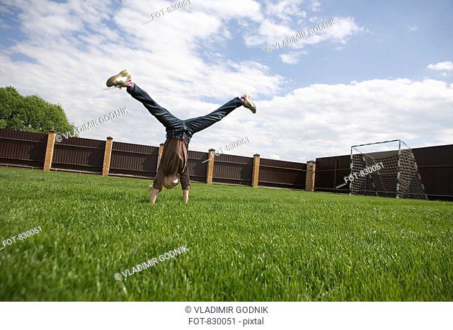 A girl doing a cartwheel