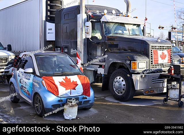 Some of the vehicles at Freedom Convoy blocking traffic to and form the United States on 08 February 2022 near the Ambassador Bridge in Windsor