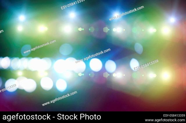 Background image with stage blurred lights and beams