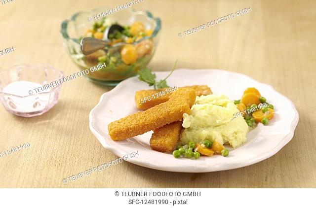 Fish fingers and mashed potatoes with a pea and carrot medley