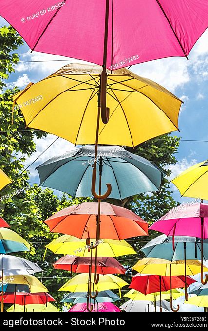 The colorful umbrellas are part of the decoration at the party mile Petofi Setany, Siofok, Somogy county, South Transdanubia, Hungary, Europe