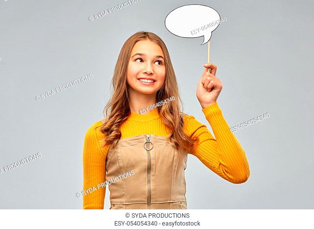 teenage girl holding speech bubble