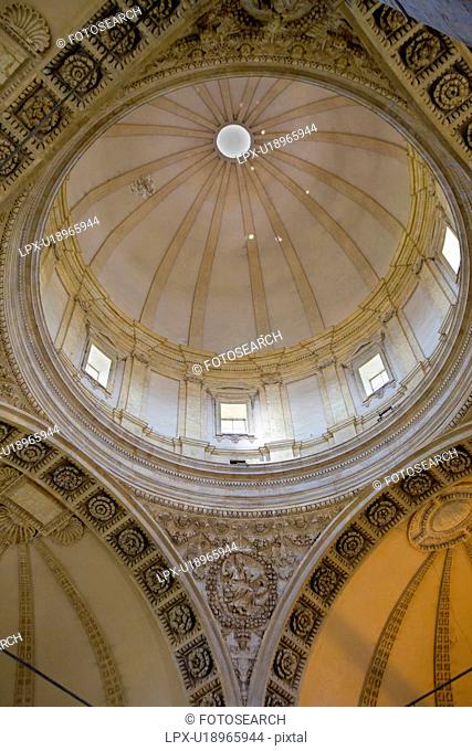 Detail view of interior of cupola of Tempio di Bramante, showing central dome and surrounding carved stone arches, Todi, Umbria, Italy