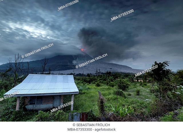 Abandoned family house in the red zone around the Sinabung on Sumatra, Indonesia