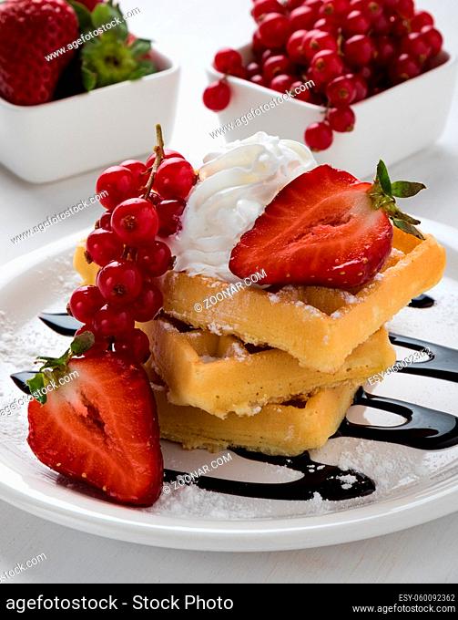 baked waffle with fruits on white plate