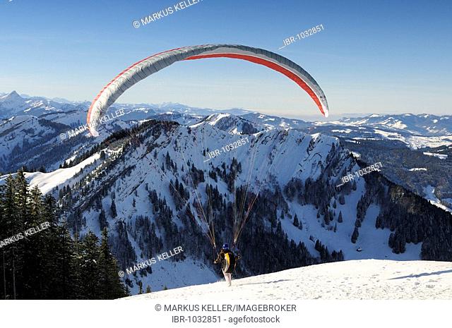 Paragliders on Mt Kronberg, short before taking off, Canton of Appenzell Innerrhoden, Switzerland, Europe