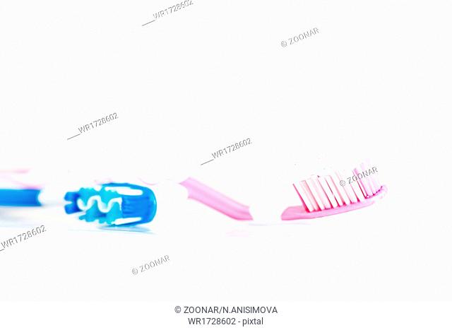 toothbrush in high key with tooth paste