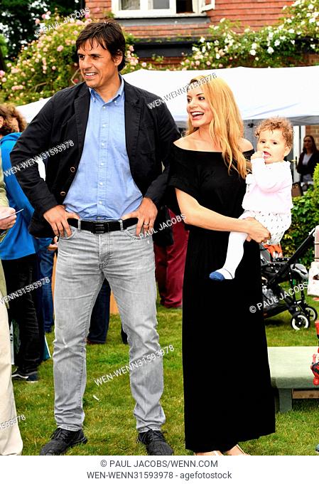 Wales football manager Chris Coleman and his wife Charlotte Jackson open the Holy Trinity Newtown Church Fete with their family in Soberton Heath in Hampshire
