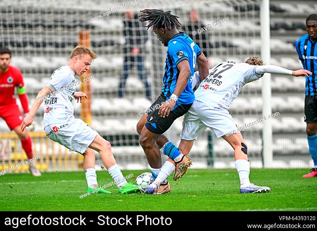 Lierse's Guillaume De Schryver, Club NXT's William Simba and Lierse's Aske Sampers fight for the ball during a soccer match between Club NXT (Club Brugge U23)...