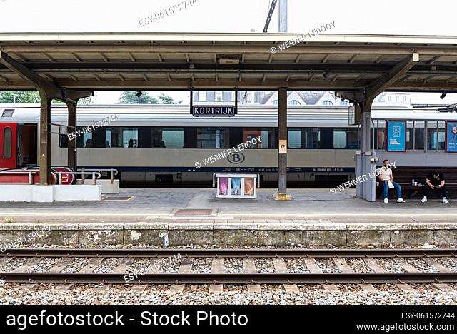 Kortrijk, West Flanders Region - Belgium. Platform and rails of the railway station