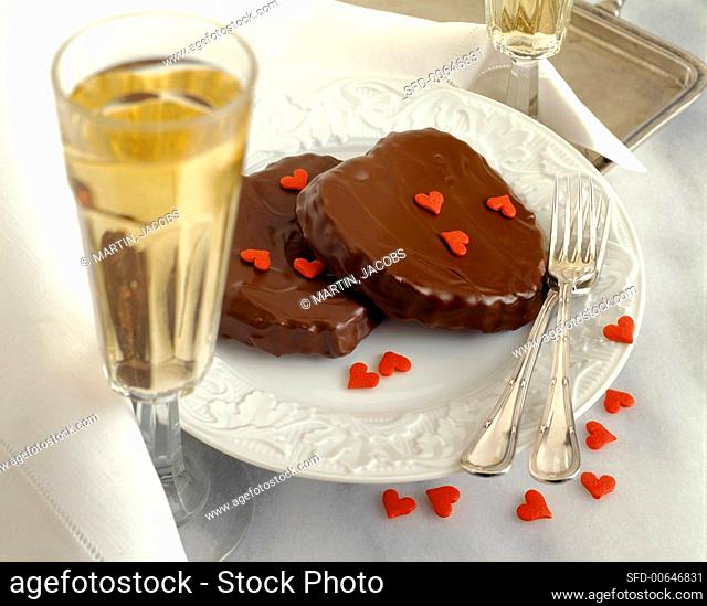 Chocolate hearts and two champagne glasses