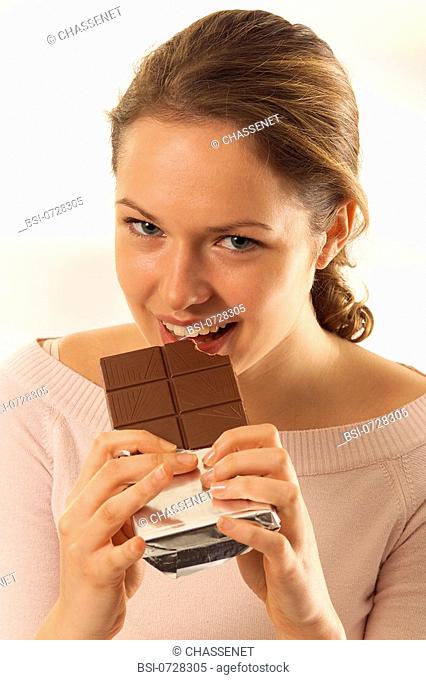 WOMAN EATING SWEETS<BR>Model