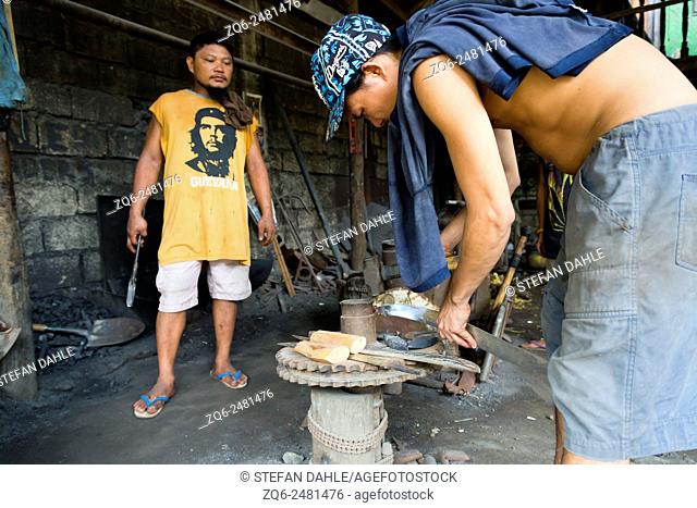 Blacksmiths at work in Puerto Princesa, Palawan, Philippines