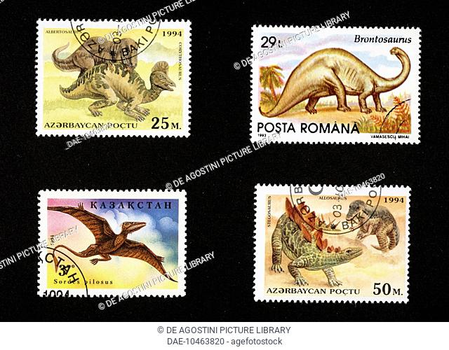 Top left and bottom right, postage stamps depicting a Albertosaurus and Corythosaurus and Stegosaurus and Allosaurus, Azerbaijan, 1994; top left