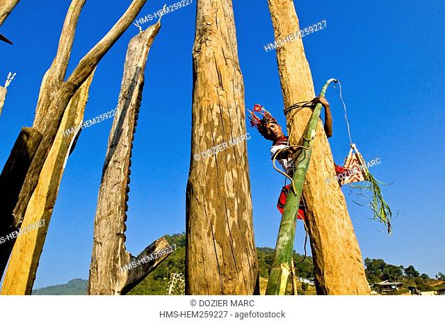 Myanmar Burma, Sagaing Division, village of Leshi, Nagas from Konyak tribe during a traditional ceremony to erect sacred posts