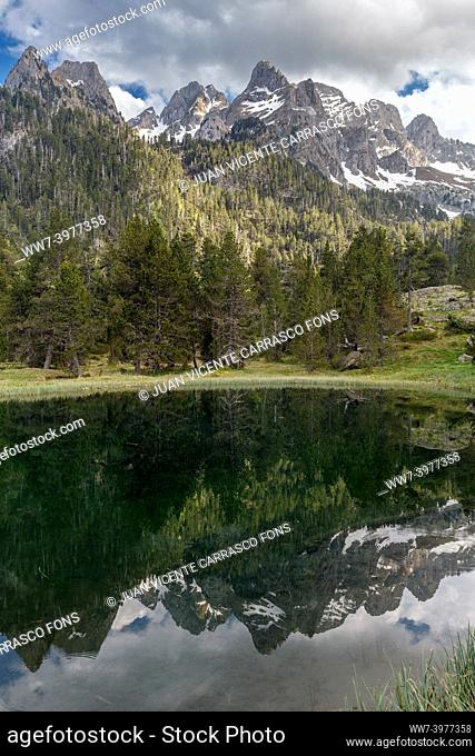Chuise peak reflected on Batisielles lake, Posets Maladeta natural park, spanish pyrenees