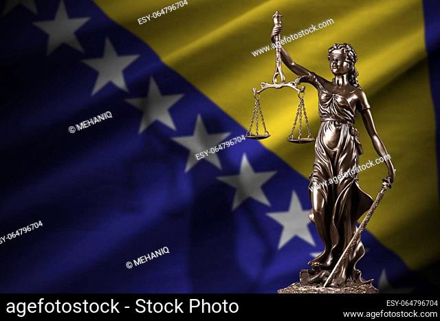 Bosnia and Herzegovina flag with statue of lady justice and judicial scales in dark room. Concept of judgement and punishment, background for jury topics