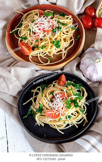 Spaguetti with tomato cheese and oregano, typical italian pasta