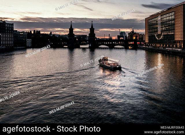 Boat on river at dusk