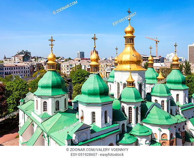 travel to Ukraine - domes of Saint Sophia (Holy Sophia, Hagia Sophia) Cathedral and Kiev city from bell tower in spring
