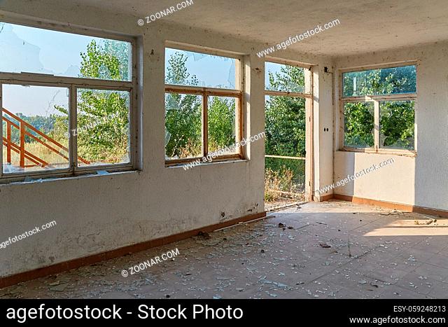 Interior of an abandoned building in bright daylight