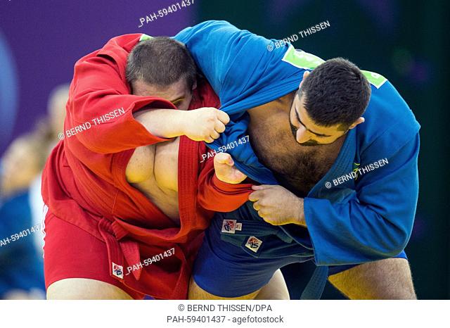 Kevin Rasit Cekic (L) of Austria competes with Razmik Tonoyan from Ukraine in the Sambo - Men's +100kg Quarterfinal at the Baku 2015 European Games in Heydar...