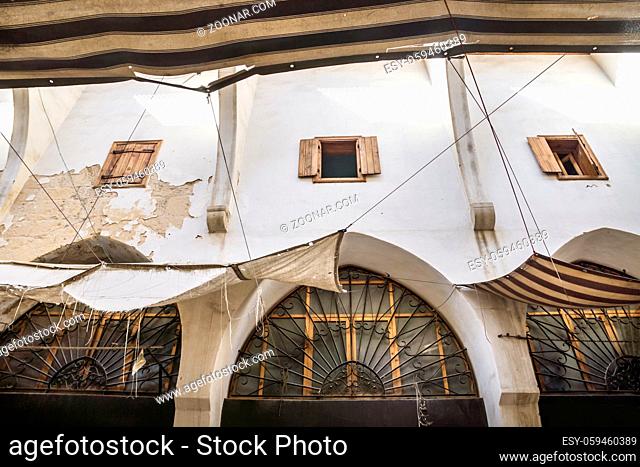 Detail of the walls with arabic windows at the traditional Souks in Tripoli, Lebanon
