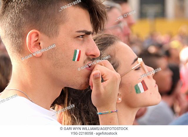 Rome, Italy 24th June 2014 Piazza Venezia Square, Italian supporters watch the World Cup football match on a big screen between Italy and Uruguay resulting in...