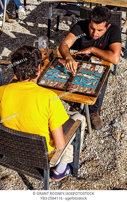 Men Playing Backgammon On The Beach, Bodrum, Mugla Province, Turkey