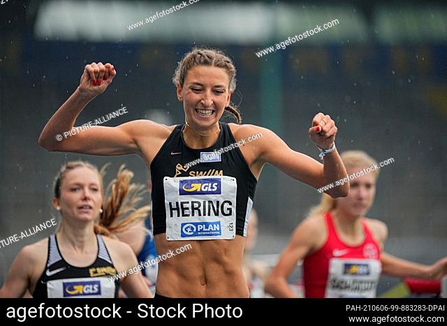 06 June 2021, Lower Saxony, Brunswick: Athletics: German Championships, 800m, Women: Christina Hering cheers at the finish line
