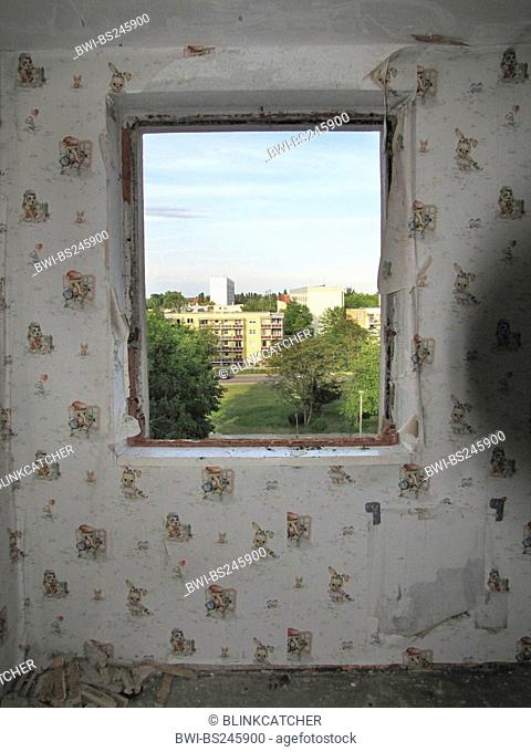 view out of the former nursery of an abandonned appartment in a run down housing estate, Germany, Mecklenburg-Western Pomerania, Magdeburg