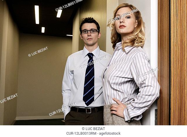 Woman and Man in office corridor