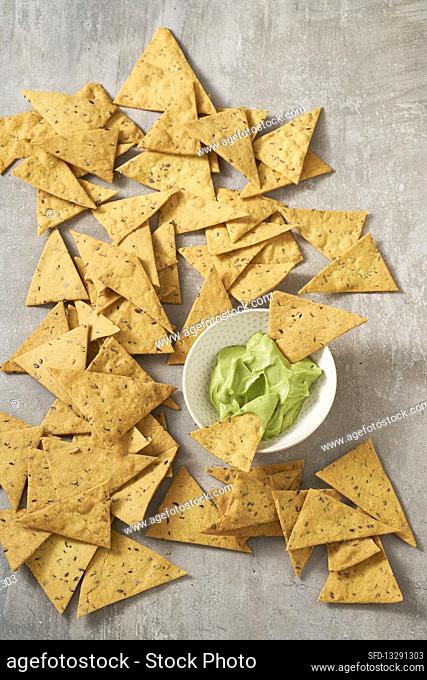 Chickpea flour tortilla chips with guacamole
