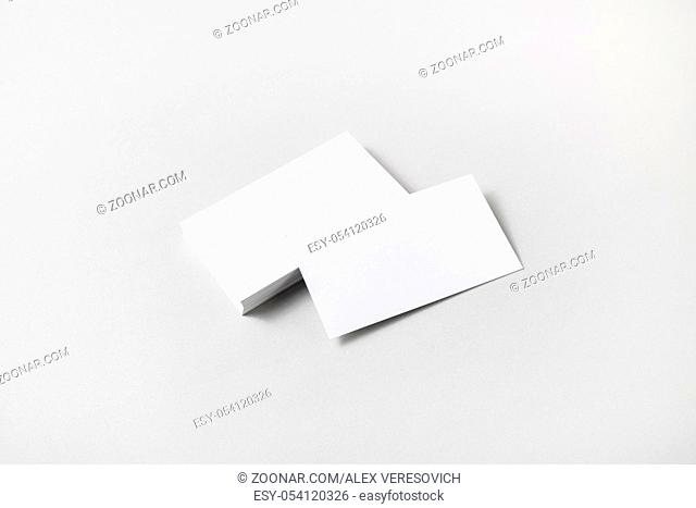 Blank white business cards on paper background. Mockup for ID. Template for graphic designers portfolios