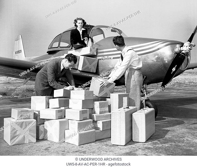 Los Angeles, California: c. 1945.North American Aviation's new personal airccraft, the NAvion. Its capacity rivals that of the passenger car ans here personnel...