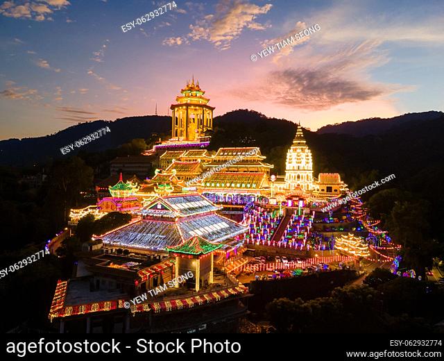 Ayer Itam, Penang, Malaysia - Feb 19 2022: Kek Lok Si temple with beauty led light decoration during sunset hour