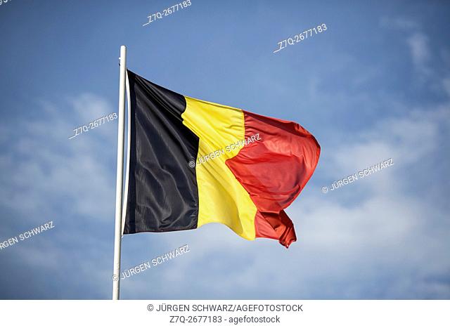 Belgian flag flies on the Saint-Charles de Potize Military Cemetery, Ypres, Belgium