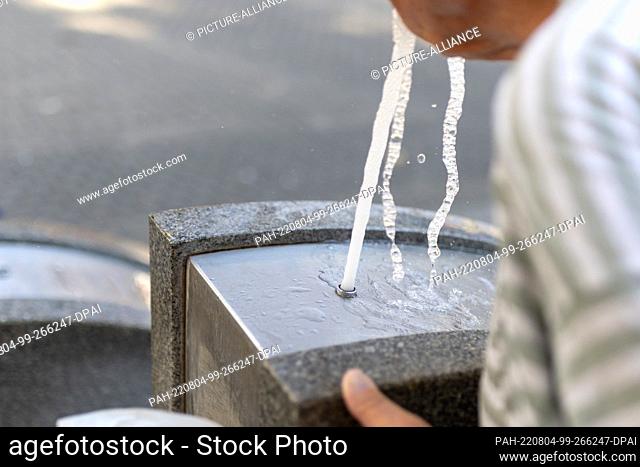 03 August 2022, Bavaria, Nuremberg: Water rises from drinking fountains in the city center. In Bavaria, too, heat is increasingly becoming a health risk